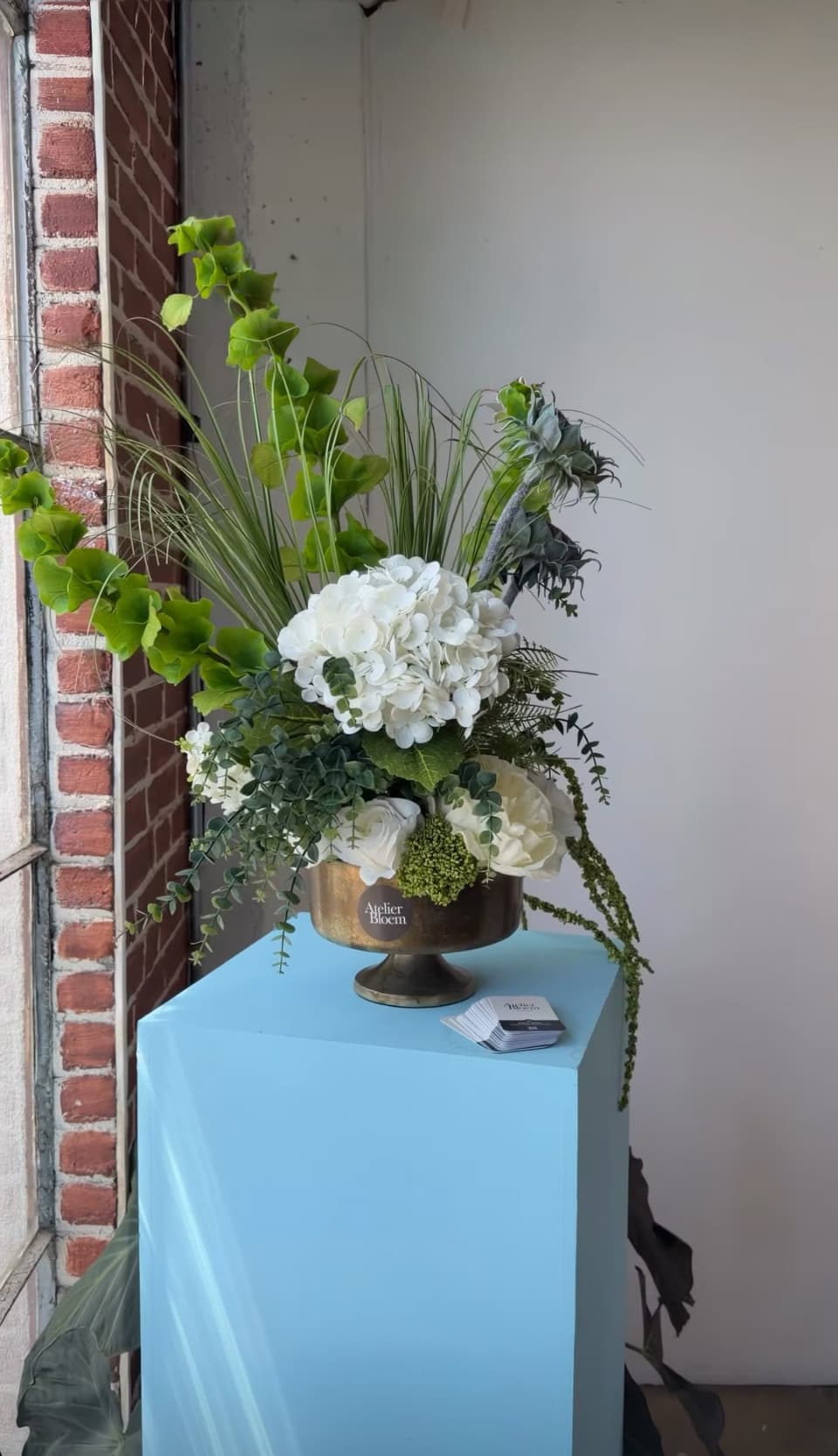 Atelier Bloem forever floral arrangement on the National Wellness Month by Live Love Spa media and creator check-in table