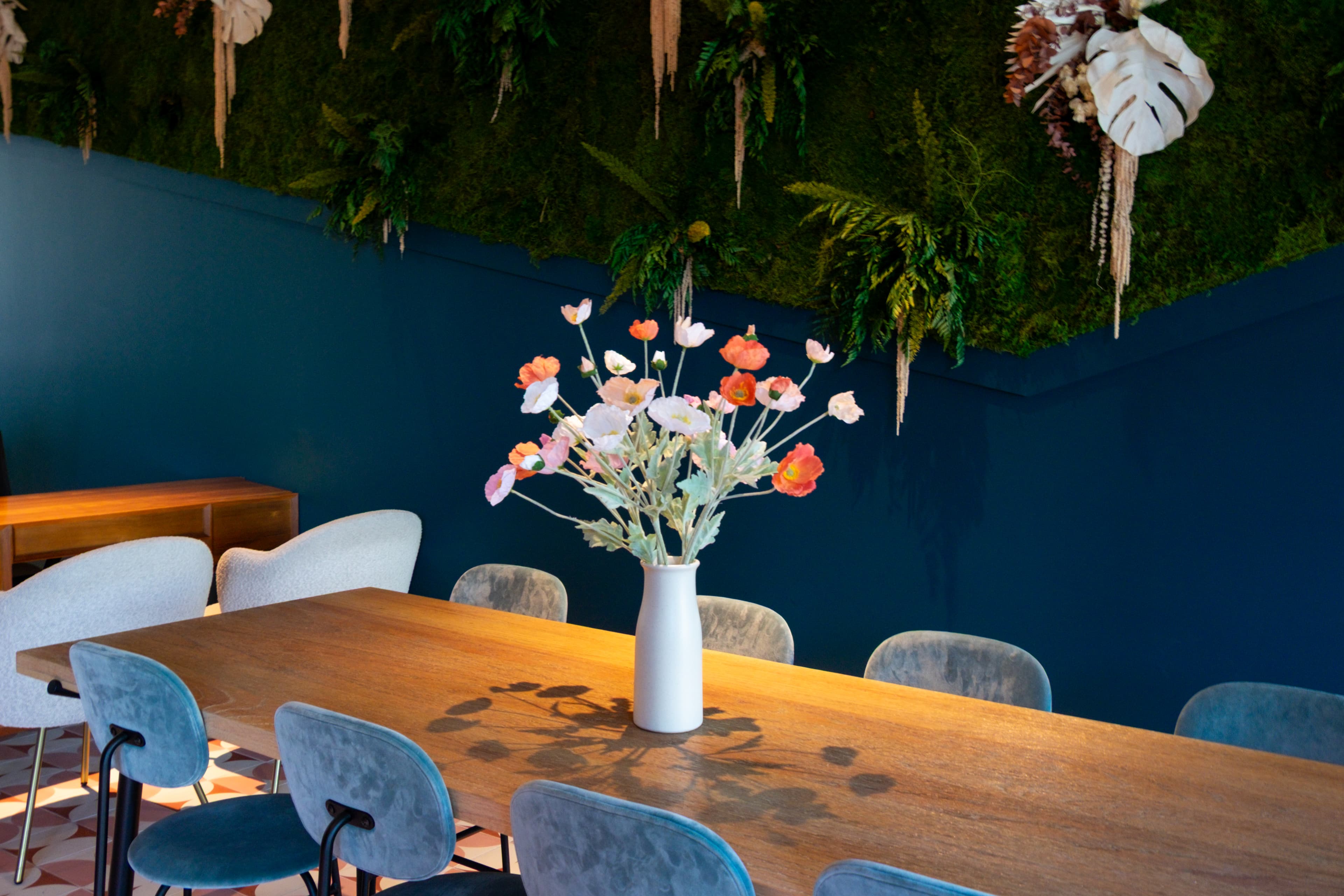 Painted Lady arrangement by Atelier Bloem at the entrance of The Charlie Mar Vista